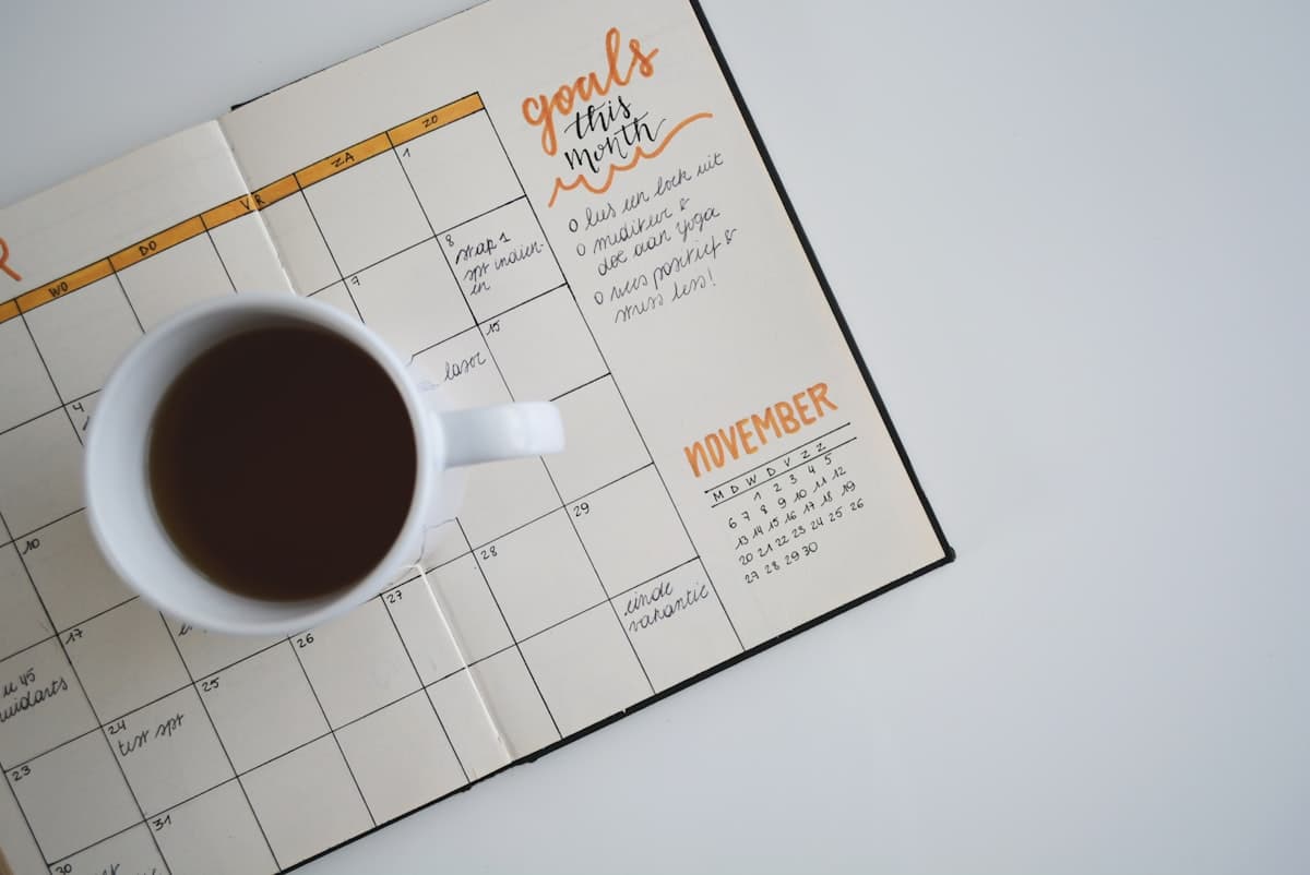 Wall-mounted calendar page — used for Auspicious Dates 2026 (inline).