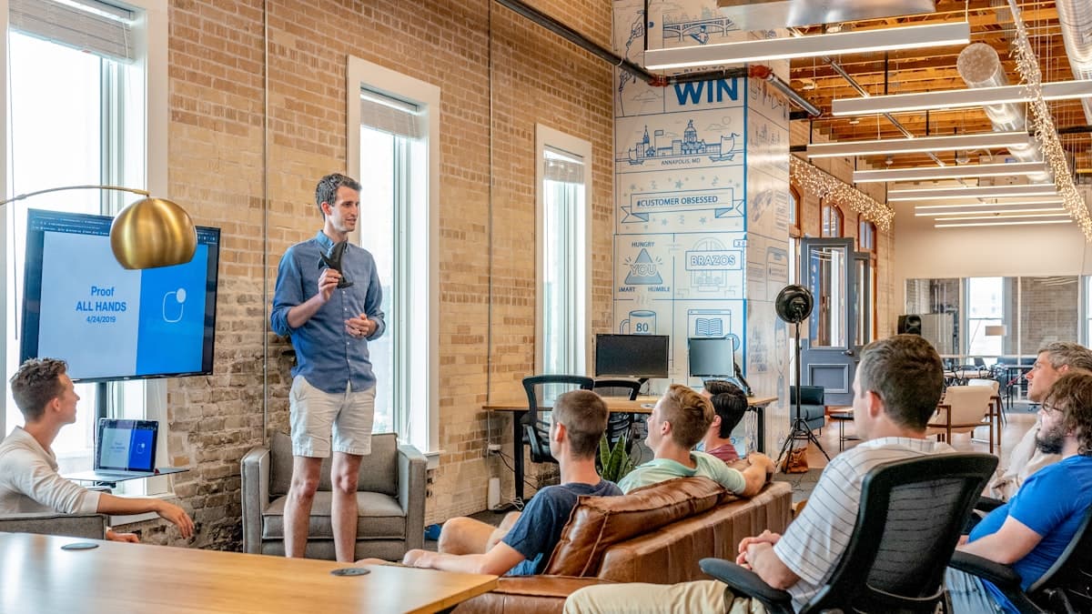Two people reviewing a laptop screen — used for Co-Founder and Angel Investing (hero).